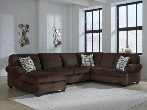 Kimlee 3 piece chocolate sectional with a chaise in a bright living room, the kind of large piece people replace and donate in Calgary