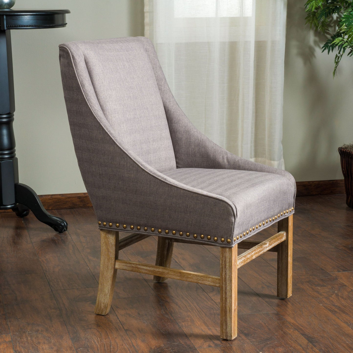 Contemporary Dining Chair with Nailhead Accents and Sloped Arms, Generously Upholstered for Comfort, 28" L x 23" W x 37.5" H, Brown Grey
