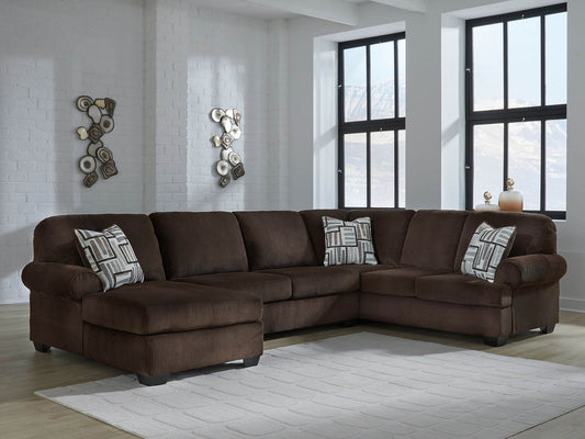 Kimlee 3 piece chocolate sectional with a chaise in a bright living room, the kind of large piece people replace and donate in Calgary