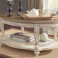 Realyn - White / Brown - Oval Cocktail Table