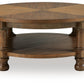 Chadworth - Round Cocktail Table - Medium Brown