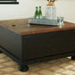 Valebeck - Lift Top Cocktail Table - Black / Brown