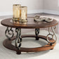 Frallyn - Round Cocktail Table - Dark Brown