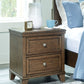 Shawbeck - Medium Brown - Two Drawer Night Stand