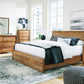 Dressonni - 4 Pc. - Dresser, Mirror, King Panel Bed - Brown