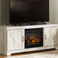 Bellaby - Whitewash - 63" TV Stand With Faux Firebrick Fireplace Insert