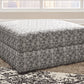 Kellway - Bisque - Ottoman With Storage