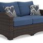 Windglow - Blue / Brown - Loveseat With Cushion