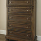 Flynnter - Medium Brown - Five Drawer Chest