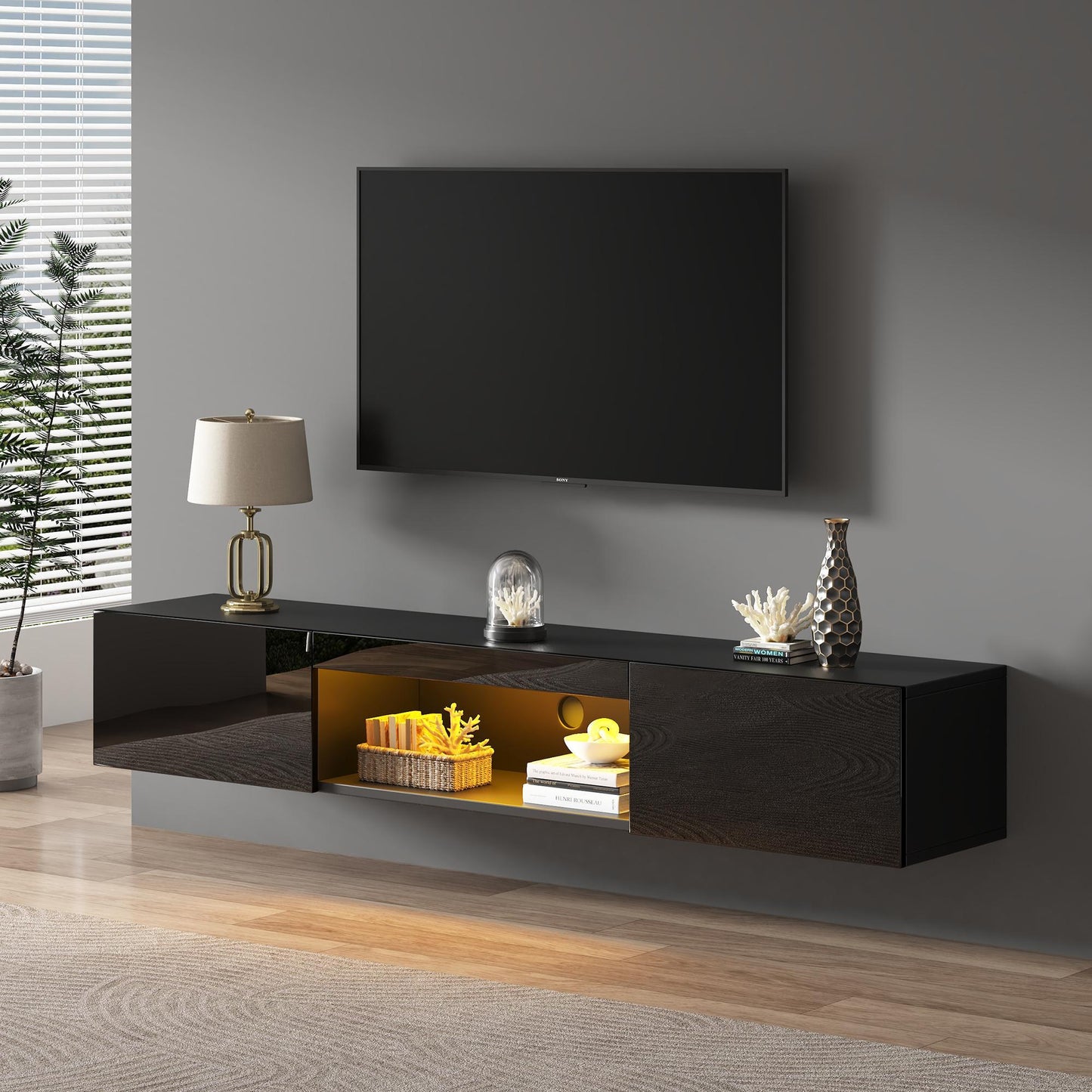 Floating TV Stand with High-Gloss Finish and LED Ambient Lighting, Sleek TV Cabinet with Pull-Down Doors, 63" L x 12" W x 8.5" H, Black