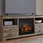Trinell - 63" TV Stand With Glass/Stone Fireplace Insert - Brown