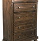 Flynnter - Medium Brown - Five Drawer Chest