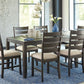 Rokane - Brown - Dining Room Table Set (Set of 7)