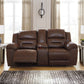 Stoneland - Chocolate - Dbl Reclining Loveseat With Console - Faux Leather