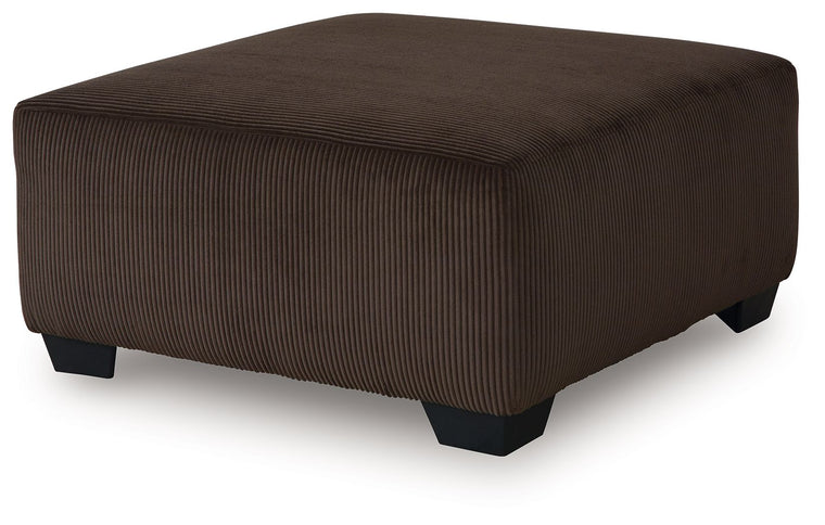 Kimlee - Sectional And Ottoman Set