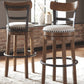 Valebeck -  Tall Upholstered Swivel Barstool