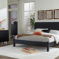Danziar - 7 Pc. - Dresser, Mirror, King Panel Bed With Low Footboard, 2 Nightstands - Black