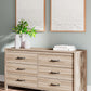 Battelle - Tan - Six Drawer Dresser