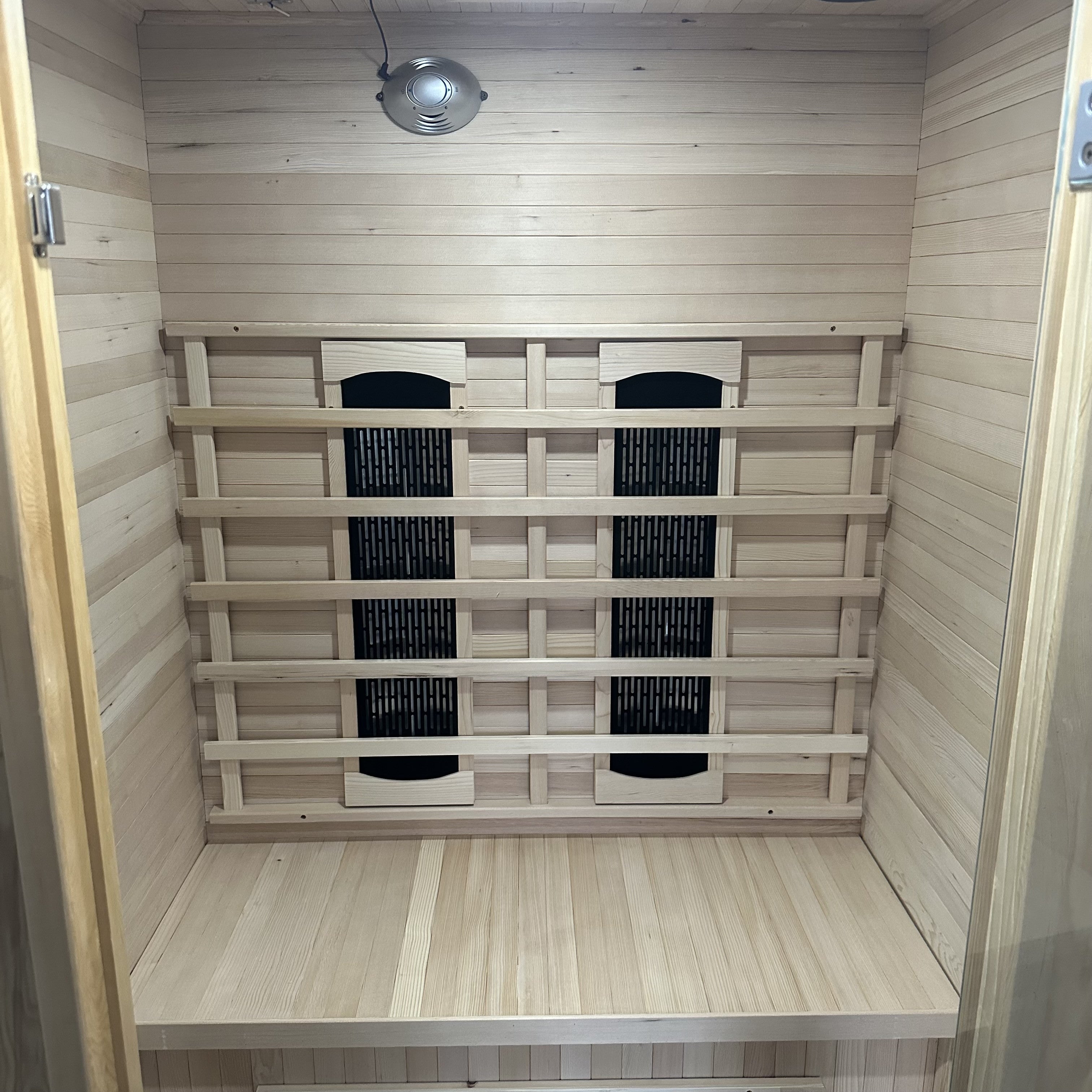 Customer photo of the two-person Haven infrared sauna in a room
