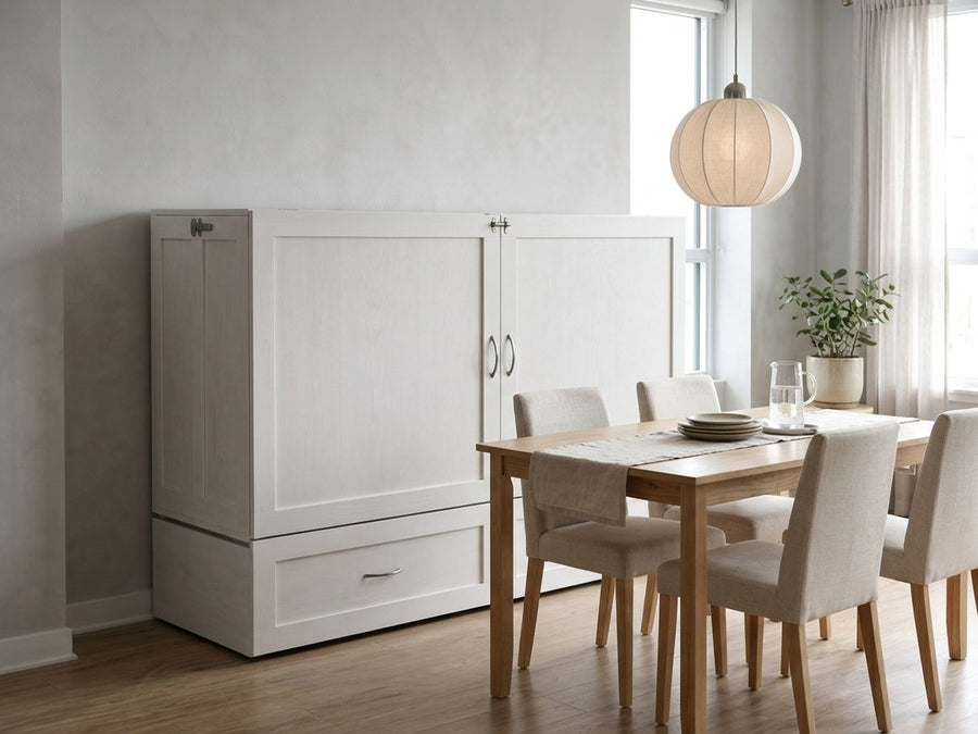 The Olivia closed as a white cabinet in a compact dining area